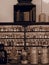 Old fashioned chemist shelves with jars sepia