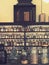 Old fashioned chemist shelves with jars sepia