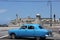 Old fashioned Cuban car and the Castle of the Royal Force, Havana