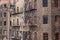 Old fashioned fire escapes and brick buildings in urban Chicago