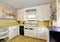 Old fashioned kitchen with white cabinets, cupboard.