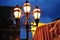 Old Fashioned lamps against dark sky backdrop