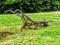 Old fashioned plough in a field