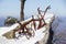 Old fashioned plough in the snow .old antique harrow at a field