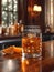Old Fashioned presented on an oak bar top in a classic American speakeasy