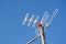 Old-fashioned radio antenna receiver set in rural wood.