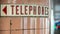 An old fashioned `Telephones` sign