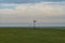 Old Fashioned Windmill along the horizon of a North Dakota Prairie