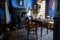 Old fashioned wooden chairs and table in sunlights, Dutch interior and room decoration in rich fisherman`s house in North-Holland