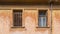 Old fashioned wooden windows, on grunge wall background