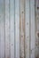 old fence wooden planks, in the style of rustic, grunge, old fashion, worn gray-blue color