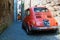 Old Fiat 500 in narrow alley of Orvieto