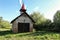 Old firehouse with wooden gate and red roof