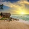 An old fisherman`s hut on the shore of a picturesque ocean and a