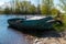 Old fishing boat in the early morning on the shore of the Bayou of lake Ladoga near the city of New Ladoga