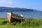 Old fishing boat on grass - Alta, Norway