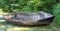 Old fishing boat lying on the shore, Latvia