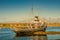 Old fishing boat rack at Ushuaia harbor in Tierra del Fuego National Park at sunset, Patagonia, Argentina