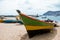 Old fishing boat on the shore. Boat with nets waiting for fishermen on the beach of Cape Verde