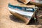 Old fishing boat on the shore. Boat with nets waiting for fishermen on the beach of Cape Verde