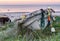 Old fishing boat used as workshop for tackles and nets