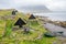 The old fishing cottages of Osvor in Bolungarvik bay in Iceland