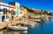 Old fishing village Porto Colom at coast of Majorca island, Spain Mediterranean Sea