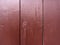 old flaked peeled weathered overpainted dark maroon brown paint wood planks background texture