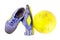 Old football shoes damaged and old dirty yellow futsal ball on white background football object isolated