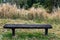 An Old Forgotten Timber Bench In The Bush