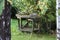 Old, forgotten wooden table in the summer at the bush