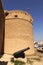 Old fort and a antique cannon outside dubai museum