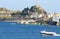 Old fortress with boats in Corfu Town Kerkyra, Corfu,Greece. High Speed HydroFoil boat ferry.