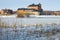 The old fortress-prison on the shores of Vanajavesi lake, March afternoon. Hameenlinna, Finland