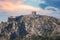 Old fortress on the top of the rocky peak at sunset, Omis, Croatia