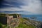 Old fortress under blue dramatic skies on the seashore