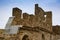 The old fortress. Wall, watchtower of an old fortress in the mountains.