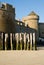 Old fortress wall and wooden stakes at Saint-Malo