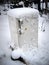 Old fridge in the snow