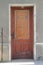 Old front door with metal grates