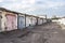 Old garages with multicolored iron gates