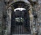 Old Gate in a Medieval Ruined Cemetery Entrance