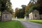 Old gatehouses and a white gate.