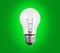 Old generation Light Bulb on green