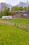 Old German brick farmhouse with a caravan in the garden