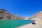 Old german campervan along the Laguna Agua Negra lake to the Paso Agua De Negra, Elqui valley near Vicuna, Chile