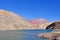 Old german campervan at the Laguna Agua Negra lake to the Paso Agua De Negra, Elqui valley near Vicuna, Chile