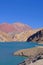 Old german campervan at the Laguna Agua Negra lake to the Paso Agua De Negra, Elqui valley near Vicuna, Chile