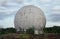 Old giant dome of a radar antenna of a Russian military base