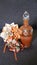 Old glass bottle decorated with origami and biedermeier bouquet